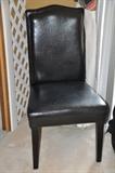 Black leather cushioned chair