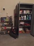 Garage filled with tools and other misc items. 