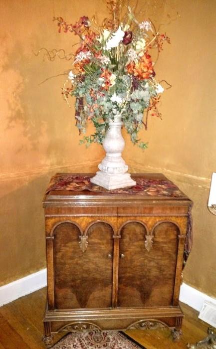 antique radio cabinet & floral arrangement