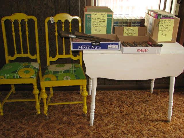 The drop leaf table has been sold but we have the 2 yellow chairs available - Sets of books and a few tools