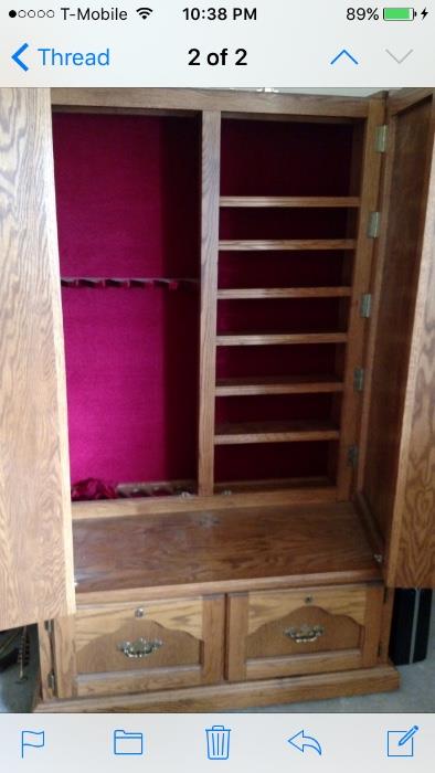 hidden gun / rifle cabinet with curio in front
