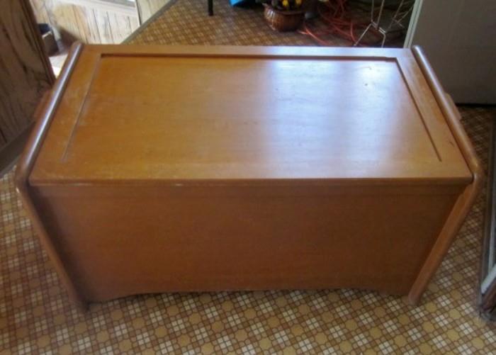 Solid wood storage/toy chest.