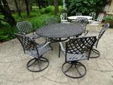 metal outdoor table with 6 swivel chairs