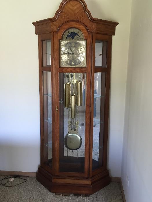 Grandfather Clock by Ridgeway made in USA. Also has glass shelves and serves as curio cabinet