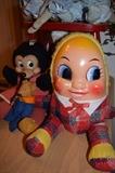 Vintage Minnie Mouse doll on left and Celloid toy on right