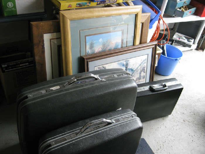 luggage and brief case, more framed pictures