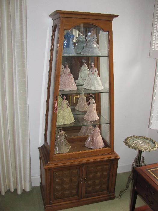 Curio cabinet with frozen lace dolls