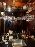 a Bar Fully Stocked with great glassware & more