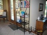 Bakers rack, wine rack and cookbooks