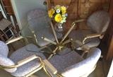 Glass Octagonal Dining Table with 4 Rolling Chairs (Newly Reupholstered)