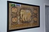Sequin artwork from Thailand containing five elephants