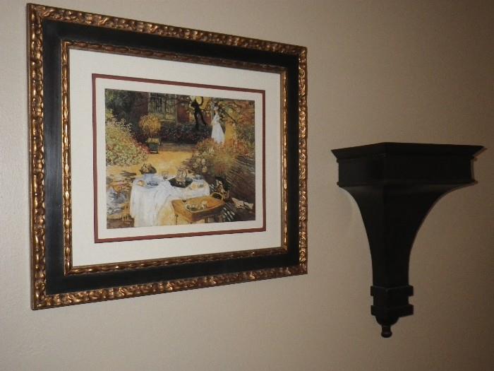 framed print and single wall sconce