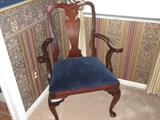 armed chair with blue upholstery