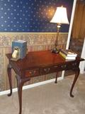 Ladies desk, lamp, bookends and books