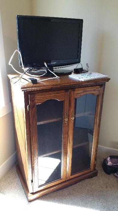media center or display cabinet -- top opens, shelves adjustable    Samsung flat screen 20" TV with remote