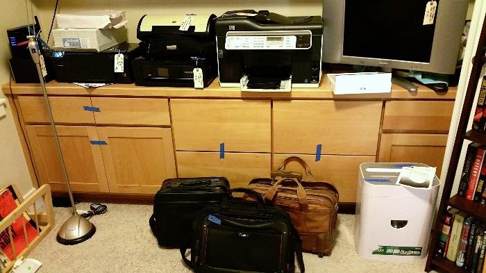 multiple printers, laptop bags, 2nd flat panel TV