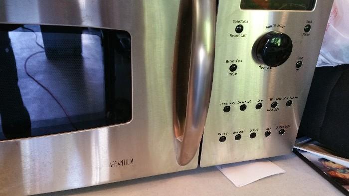 high end GE Profile over stove microwave & vent