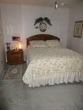 Queen size bed with night stand