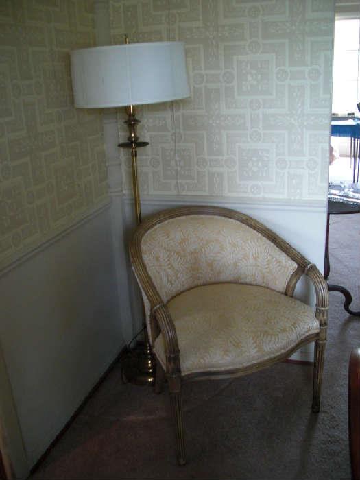 Stunning curved back chair and brass floor lamp