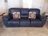 Leather reclining sofa