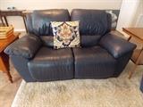 Leather reclining loveseat