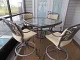 Hampton Bay bar height patio table and 4 chairs with back/seat cushions.