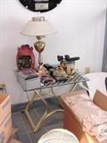 Glass and brass side table, tole lamp