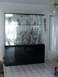 Lighted glass and black lacquer display cabinet