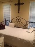 Day bed; bedding; decorative wall cross