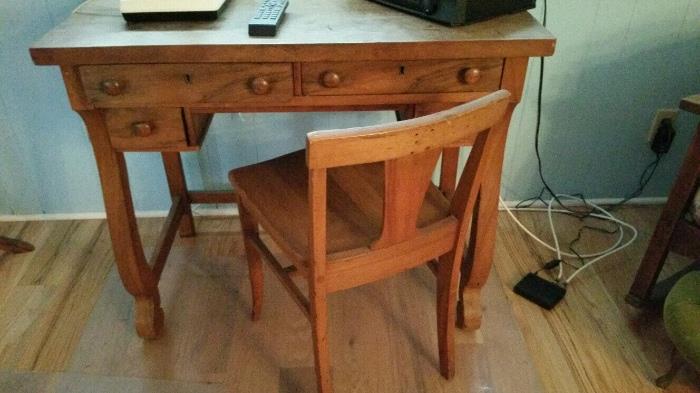 Antique desk looks like burl wood or maple