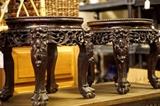 Pair of ornately carved plant stands  
