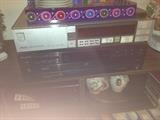 Akai amplifier and Sony 6-CD changer.