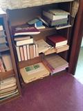 Bookshelf packed with books.
