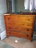 Four-drawer maple chest.