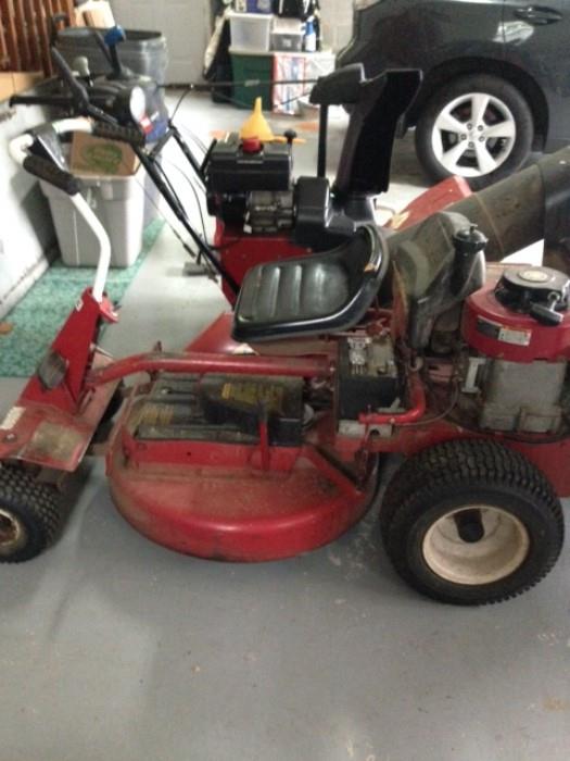 OLD BUT HAS A NEW MOTOR RIDING SNAPPER MOWER 