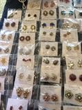 Many pieces of vintage costume jewelry