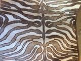 4 feet x 5 feet "zebra" rug