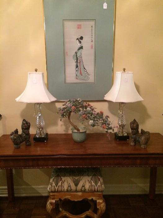 Sofa/entry table, matching lamps, small stool, and soapstone arrangement