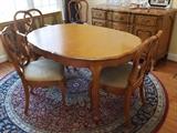 Oval table with 4 chairs and extra leaf  $150