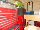 several tool boxes full of tools