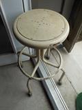 Antique rolling stool