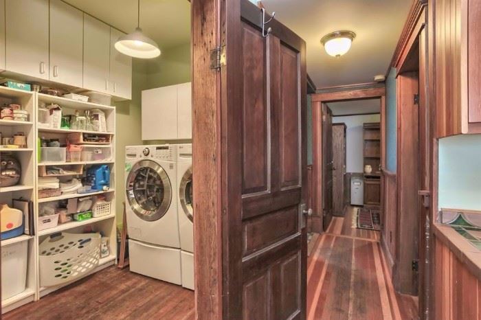 Pantry with washer and dryer. 
