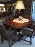 Game  or  Dining table 6 Arm chairs one large leaf