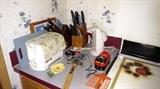 Toaster, can opener, knife set in block, cutting boards