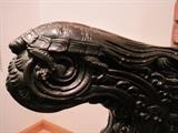 Detail of turtle carving.