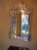 Large Venetian mirror.