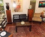 Lots of Mid Century Modern Furniture. Modern art as well.