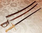 Civil War Cavalry Officer's Saber. French Import with correct Civil War period inspector marks. Also, Ames Militia officers sword w/ pearl grip.