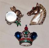 We are going through boxes of jewelry. Gold, sterling, etc. Here is a highlight of the costume jewelry...Trifari jelly brooches. 