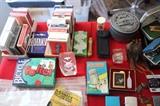 playing cards, lighters, knife, paperweight